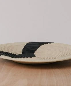 KAZI Striped Black + Natural Raffia Plate II 2 KAZI Striped Black + Natural Raffia Plate II